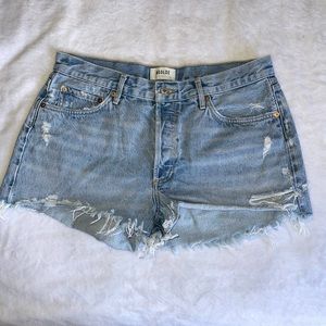 Agolde jean shorts, light wash with de-stressing.